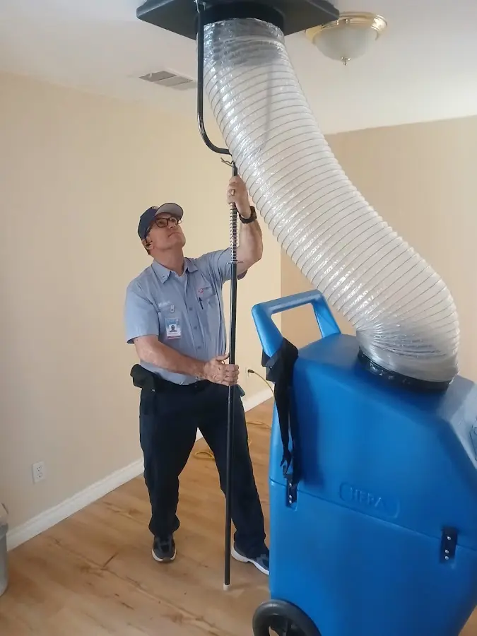 Mini Split Installation technician using HEPA equipment in Gulfport